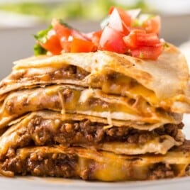 a piece of Cheesy Beef Quesadilla on a plate