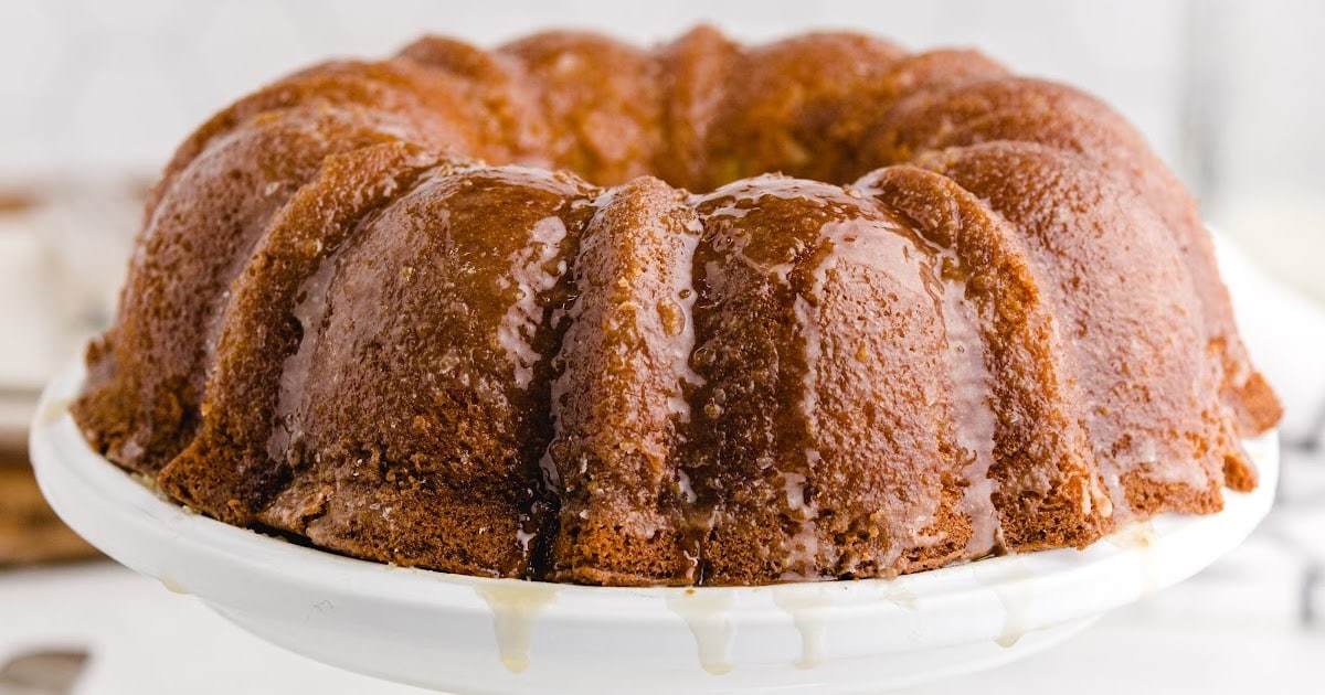 a whole Kentucky Butter Cake on a white cake stand