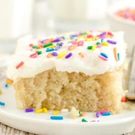 a piece of Vanilla Crazy Cake on a white plate