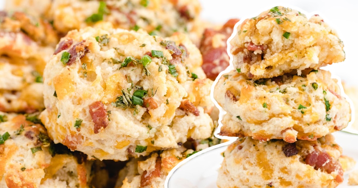 a stack of Bacon Cheddar Biscuits on a white plate