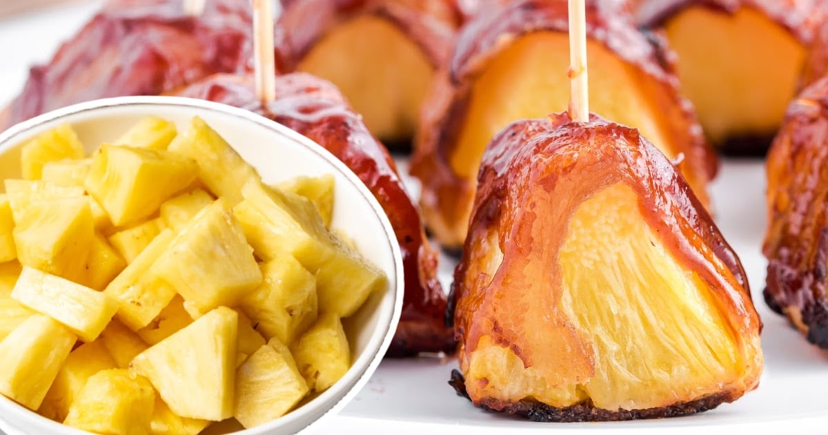 a bowl full of Bacon Wrapped Pineapple pieces and Bacon Wrapped Pineapple pieces at the back