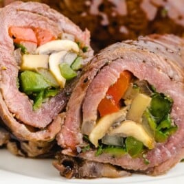 two Balsamic Glazed Steak Rolls on a plate