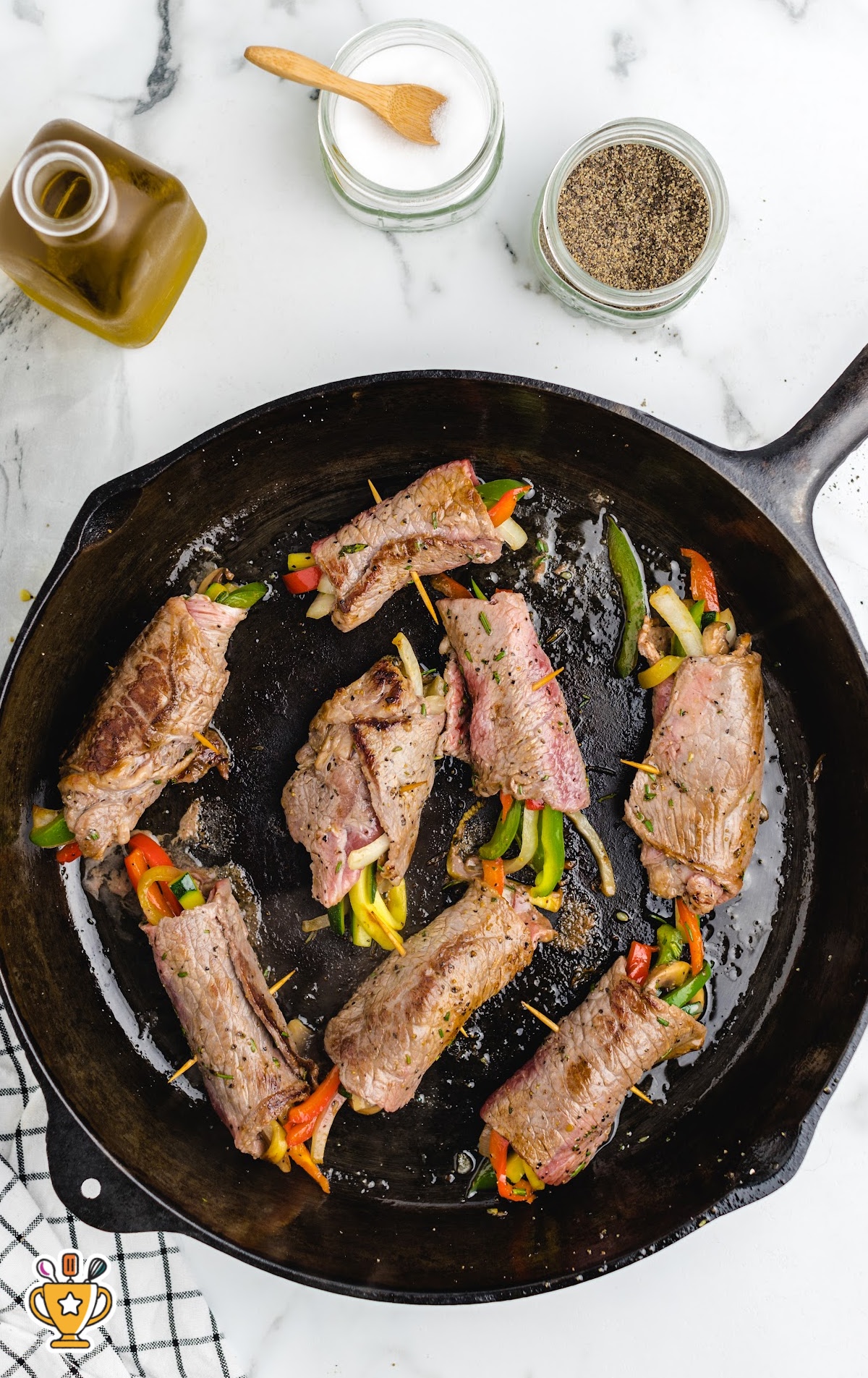 Balsamic Glazed Steak Rolls in a skillet