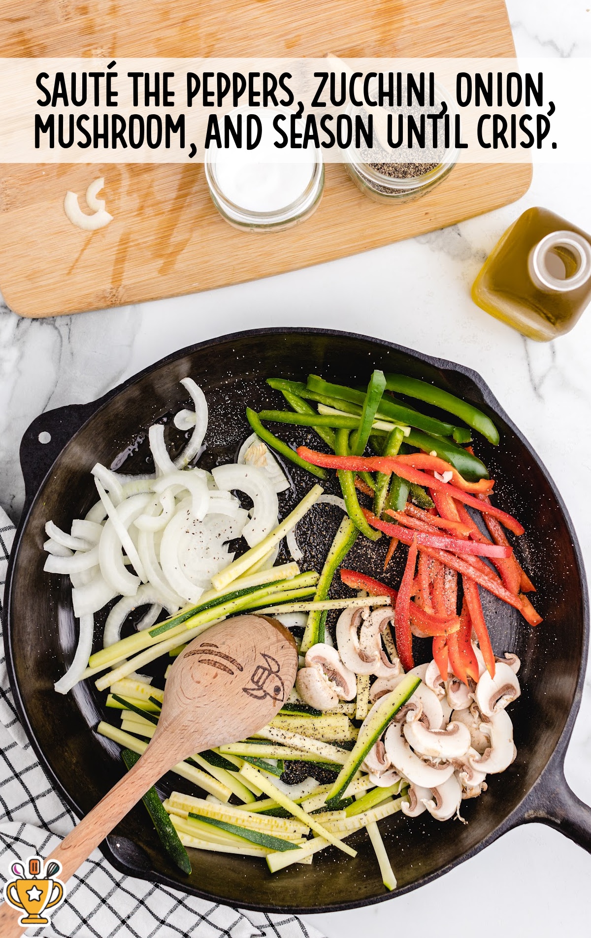 peppers, zucchini, onion, mushroom mixed in a skillet