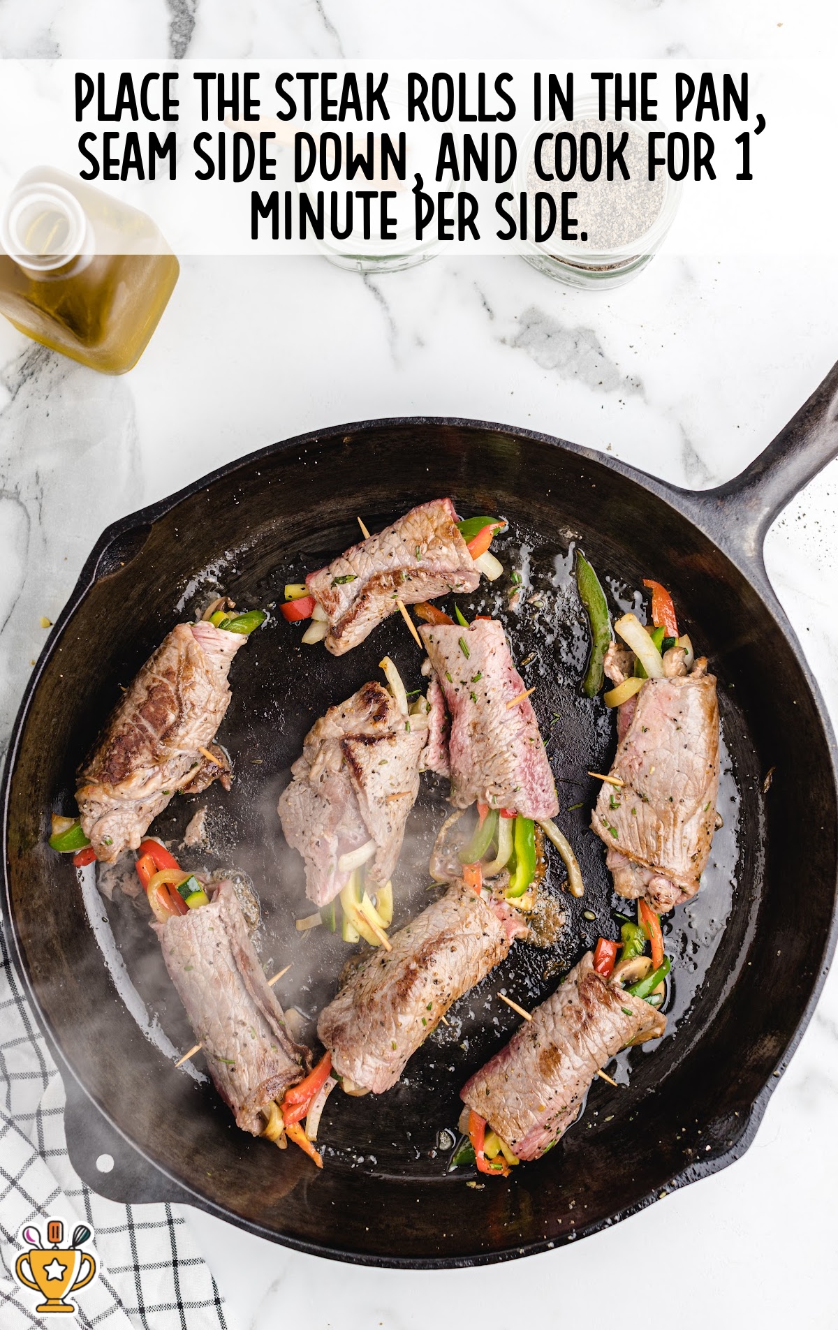 cooking Balsamic Glazed Steak Rolls in the pan
