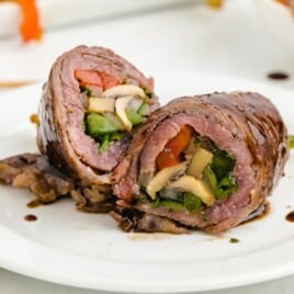 two rolls of Balsamic Glazed Steak on a plate