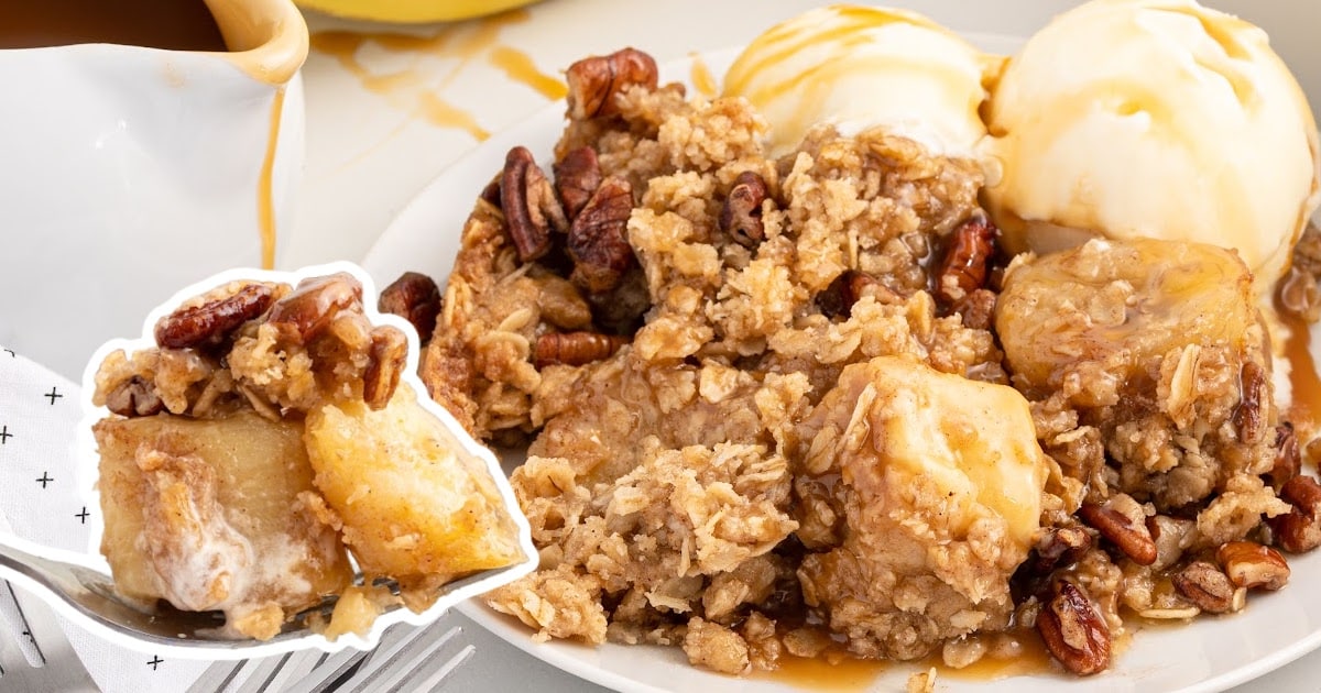 Banana Crumble on a plate and a fork holding some Banana Crumble