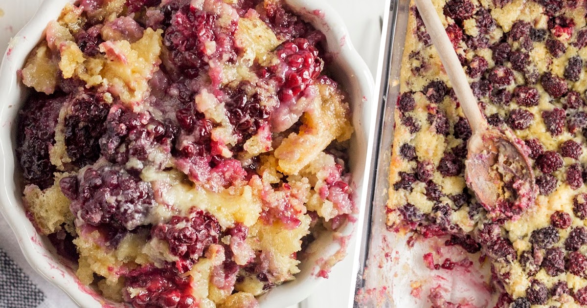 Spoonful of warm blackberry cobbler with golden cake and dark berries above serving bowl.