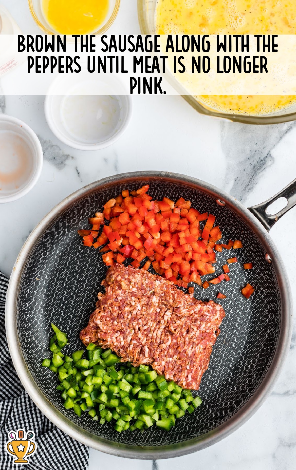 Breakfast Crescent Ring ingredients in a skillet