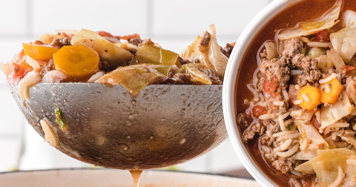 a serving spoon holding some Cabbage Roll Soup