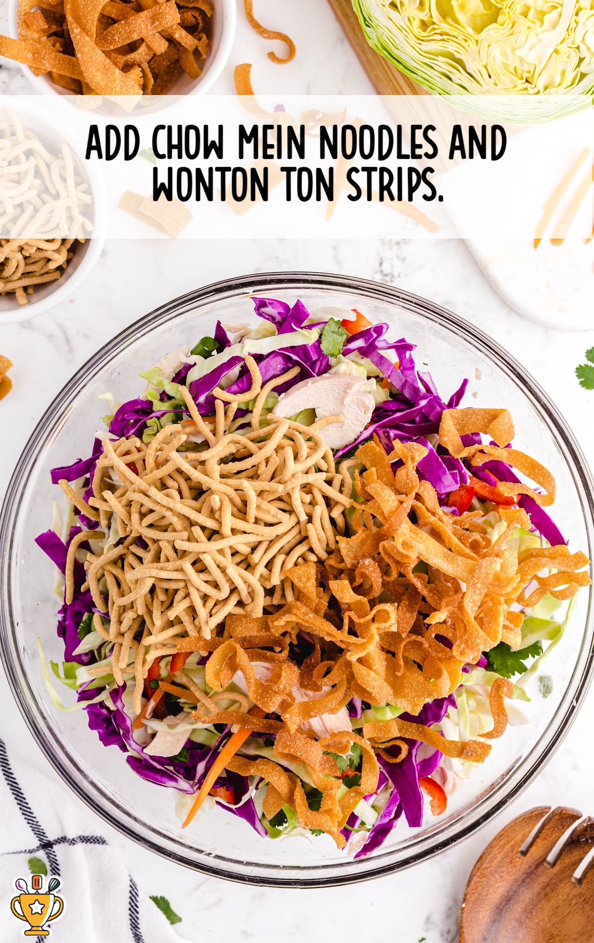 chow mein noodles and wonton ton strips added in a bowl