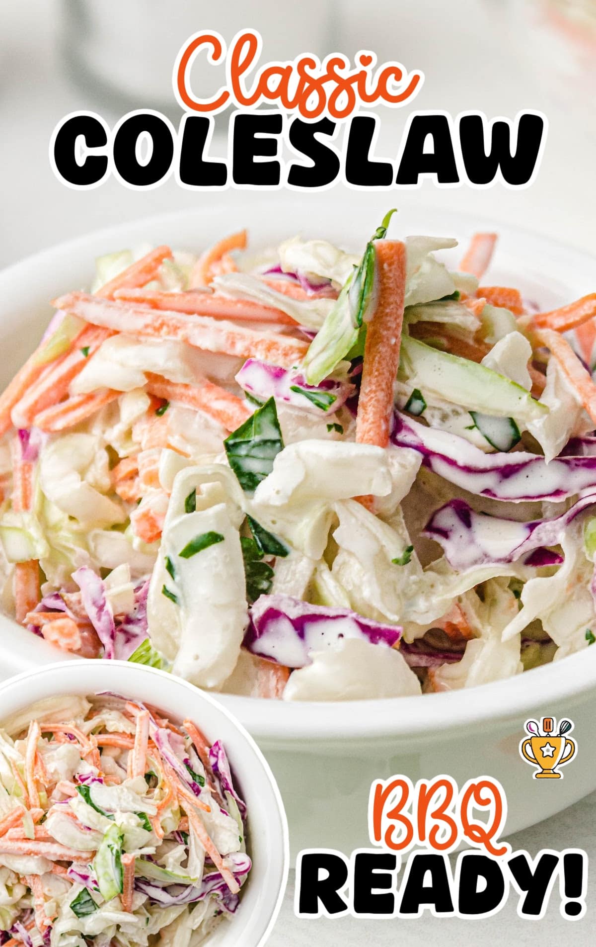 A close-up shot of creamy coleslaw in a glass bowl, showing vibrant shredded carrots, red cabbage, and green herbs.