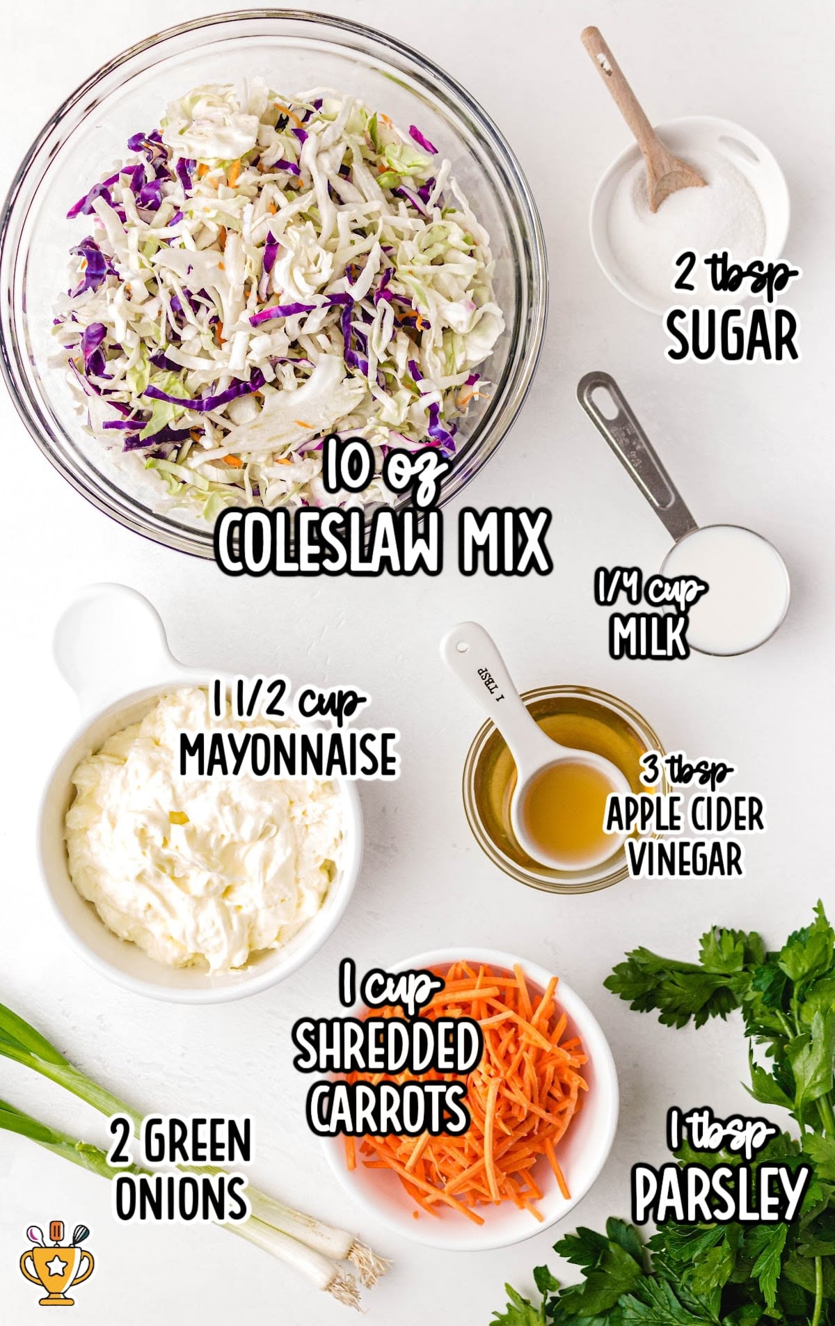 A top-down view of individual coleslaw ingredients in bowls, including shredded coleslaw mix, shredded carrots, mayonnaise, sugar, milk, apple cider vinegar, parsley, and green onions.