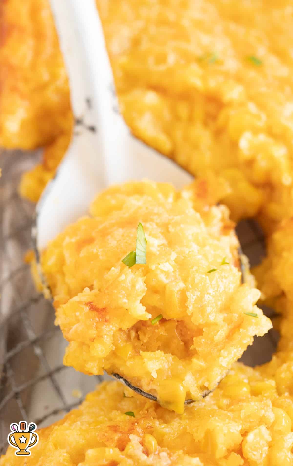 a spoon holding some Corn Casserole