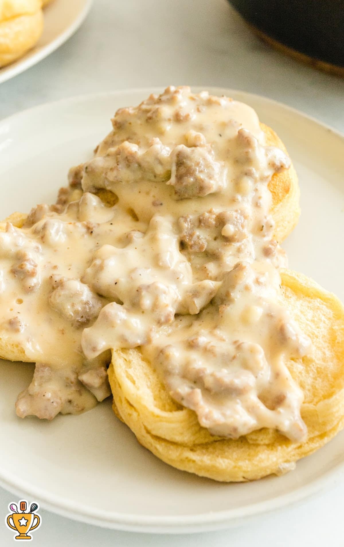 Country Biscuits and Sausage Gravy served on a plate