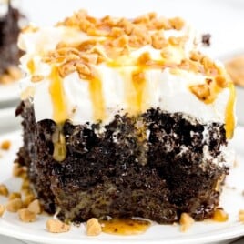 a piece of Crockpot Better Than Sex Cake on a plate