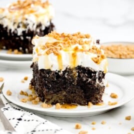 A piece of Crockpot Better Than Sex Cake on a plate