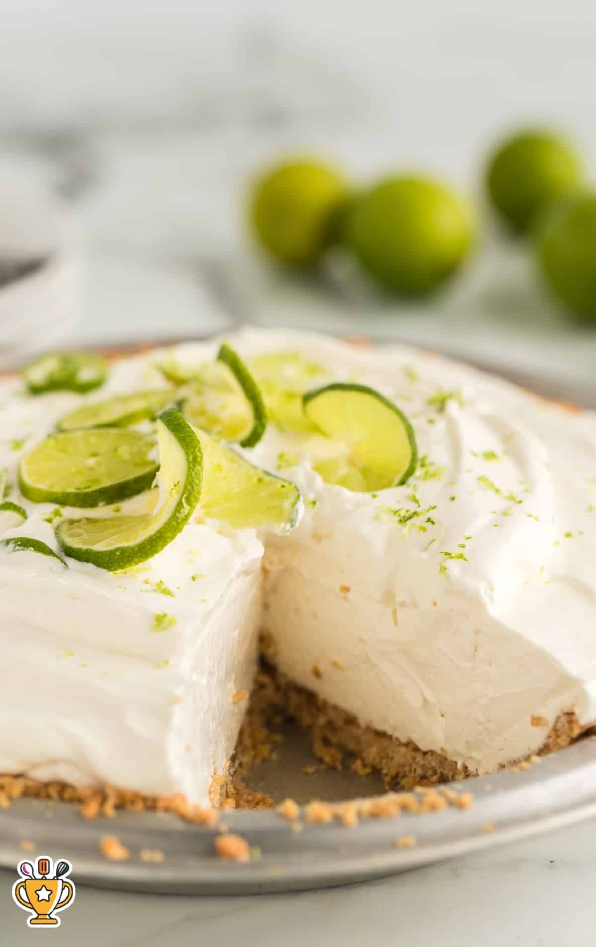 a Key Lime Pie with a piece missing