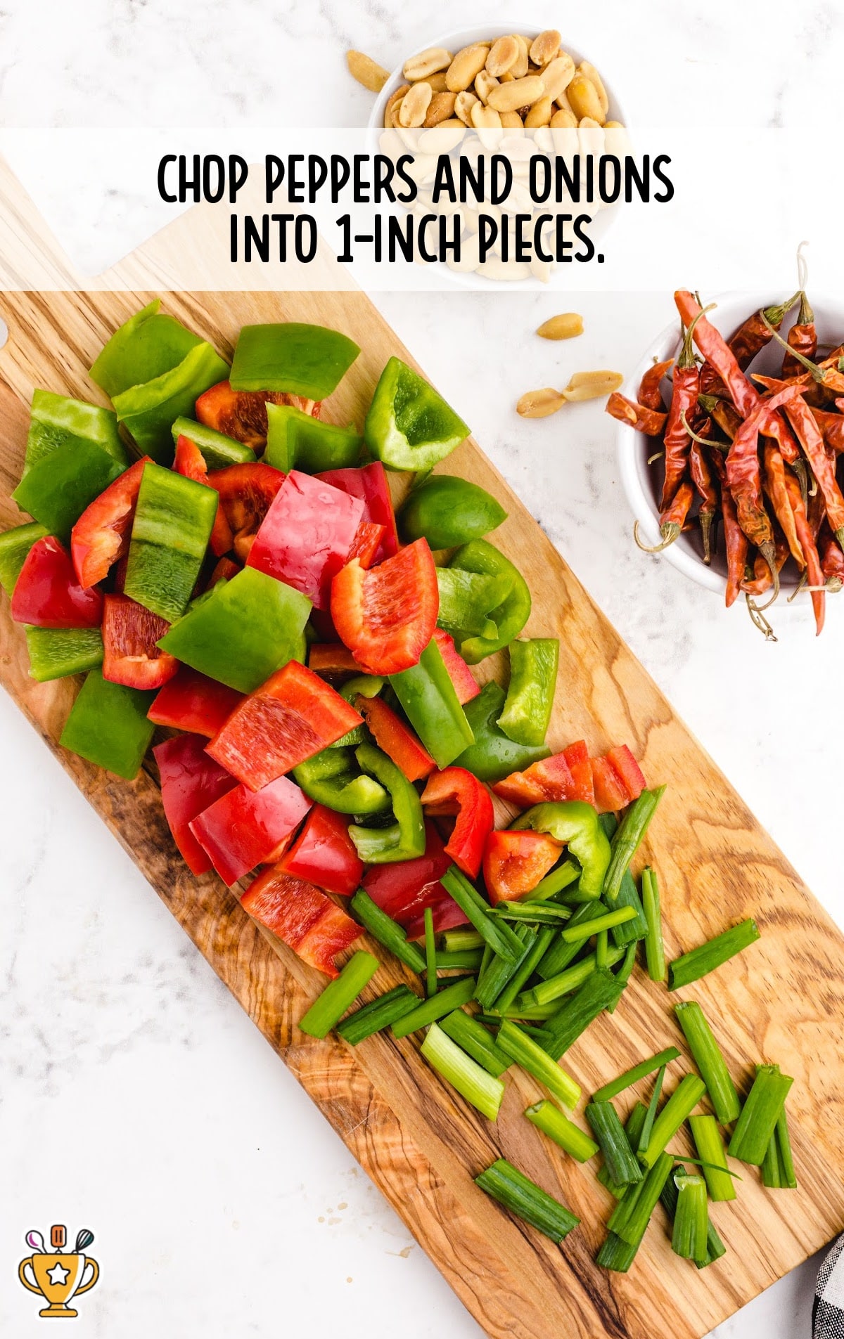 peppers and onions chopped on a wooden board
