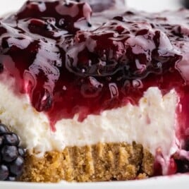 a close up photo of No Bake Blackberry Cheesecake
