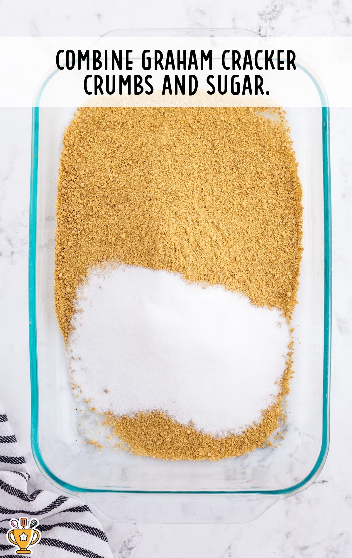 graham cracker crumbs and sugar in a baking dish