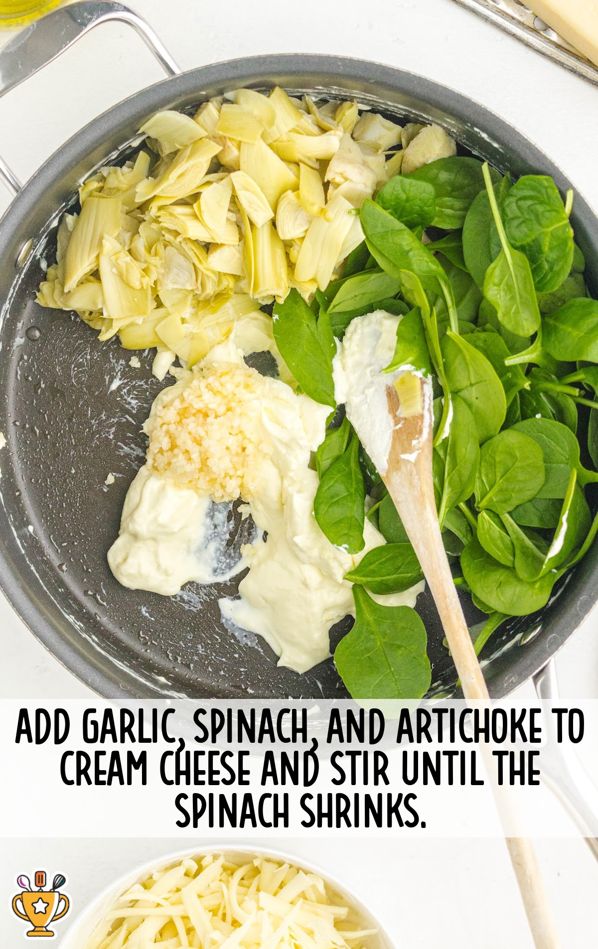 garlic, spinach and artichoke added in a pan