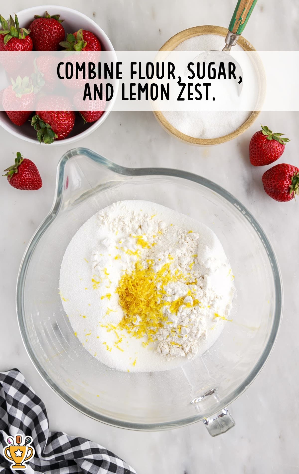 flour, sugar and lemon zest added in a bowl