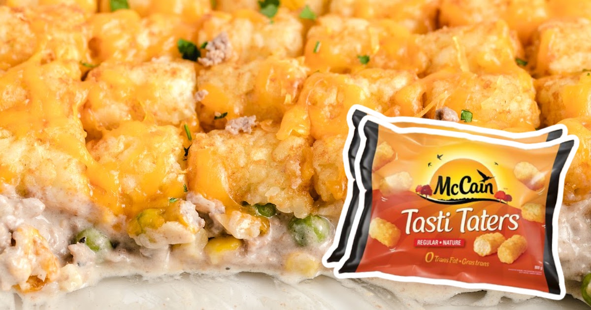 Glass dish of tater tot casserole with McCain Tasti Taters package overlayed in the lower corner.