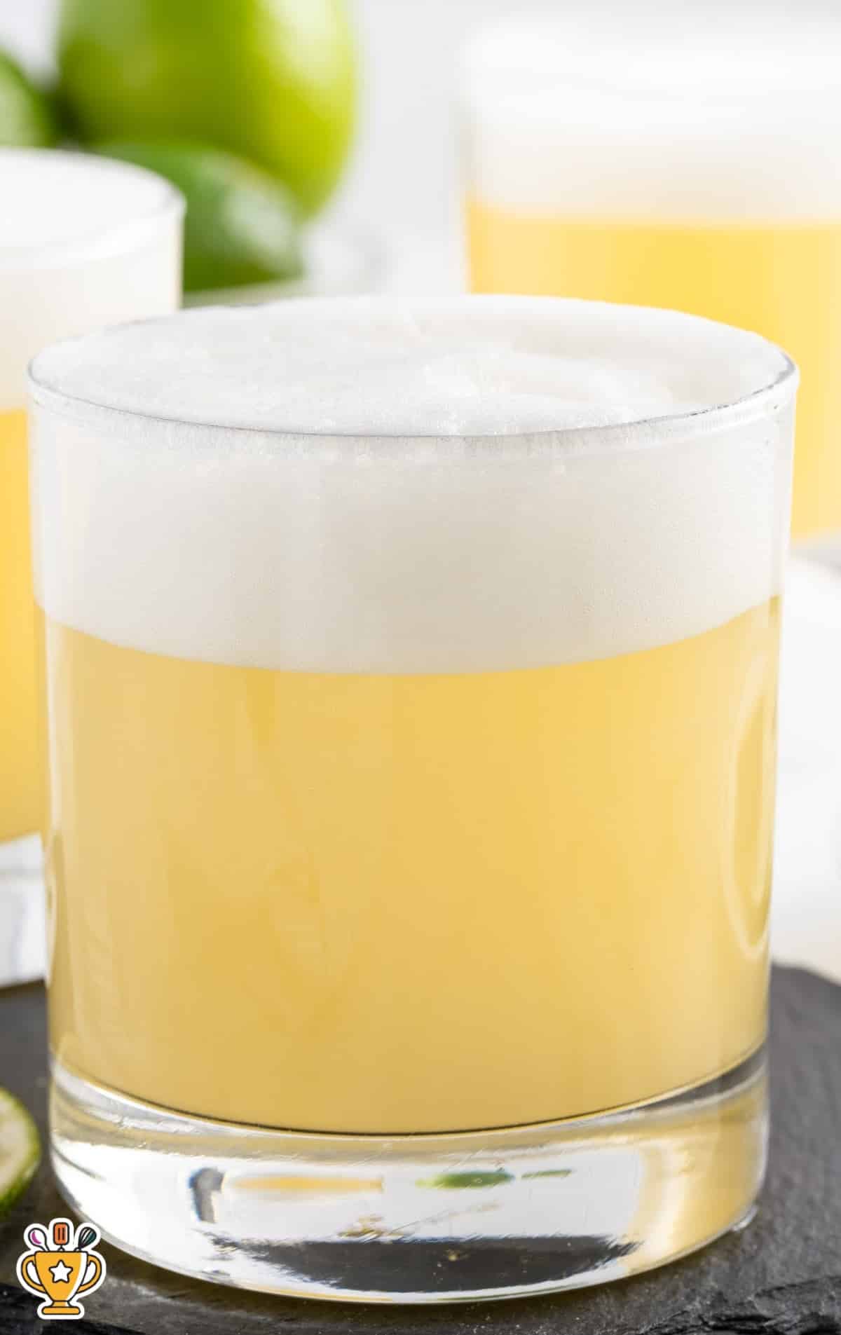 a glass of Tequila Sour