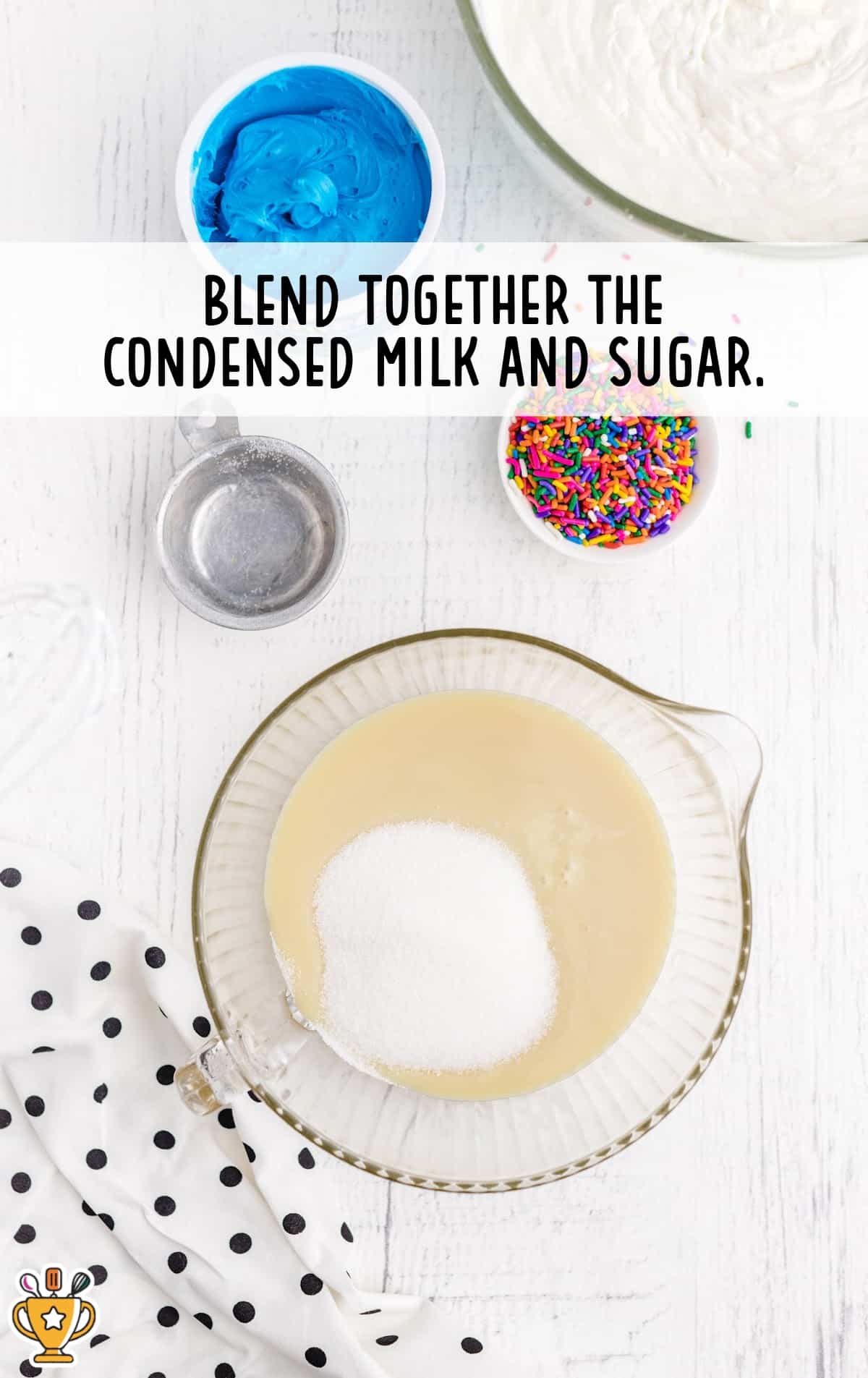 condensed milk and sugar blended together in a bowl