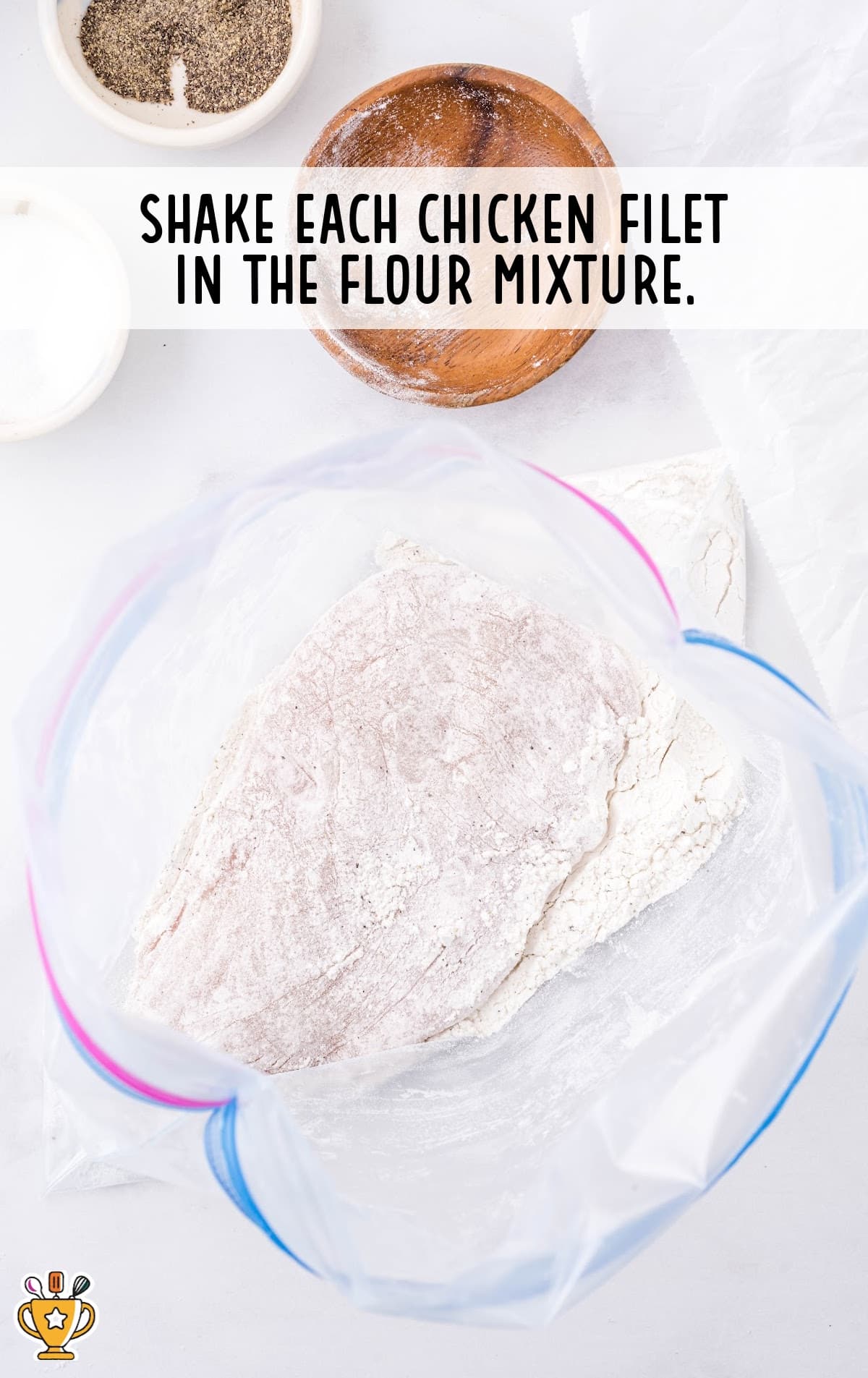 chicken fillet in the flour mixture in a Ziploc bag