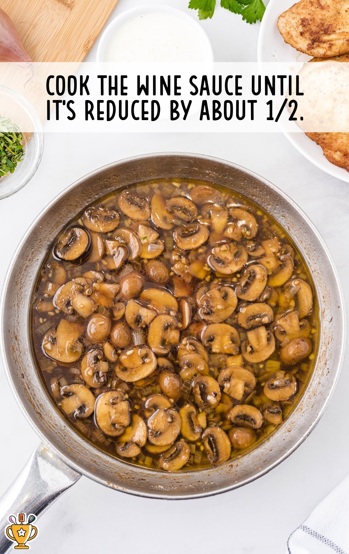 cooking the wine sauce in a pan