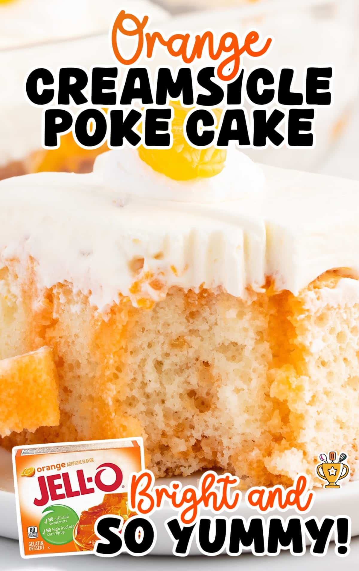 a piece of Orange Creamsicle Poke Cake on a plate