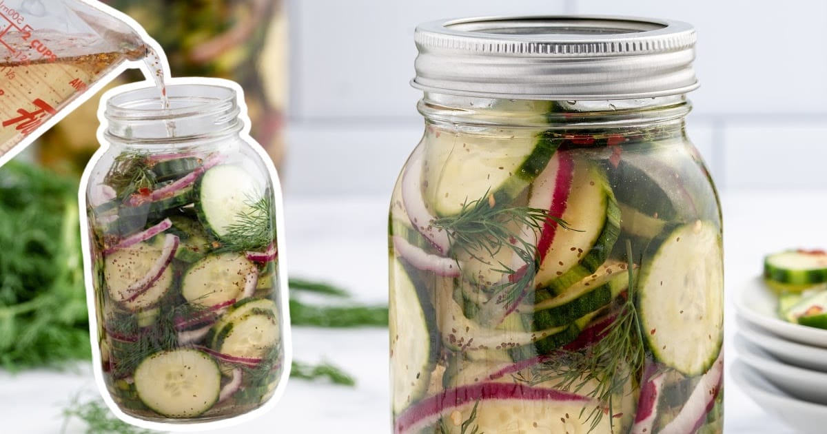 Serving bowl of cucumber salad next to mason jar filled with pickled cucumbers and herbs