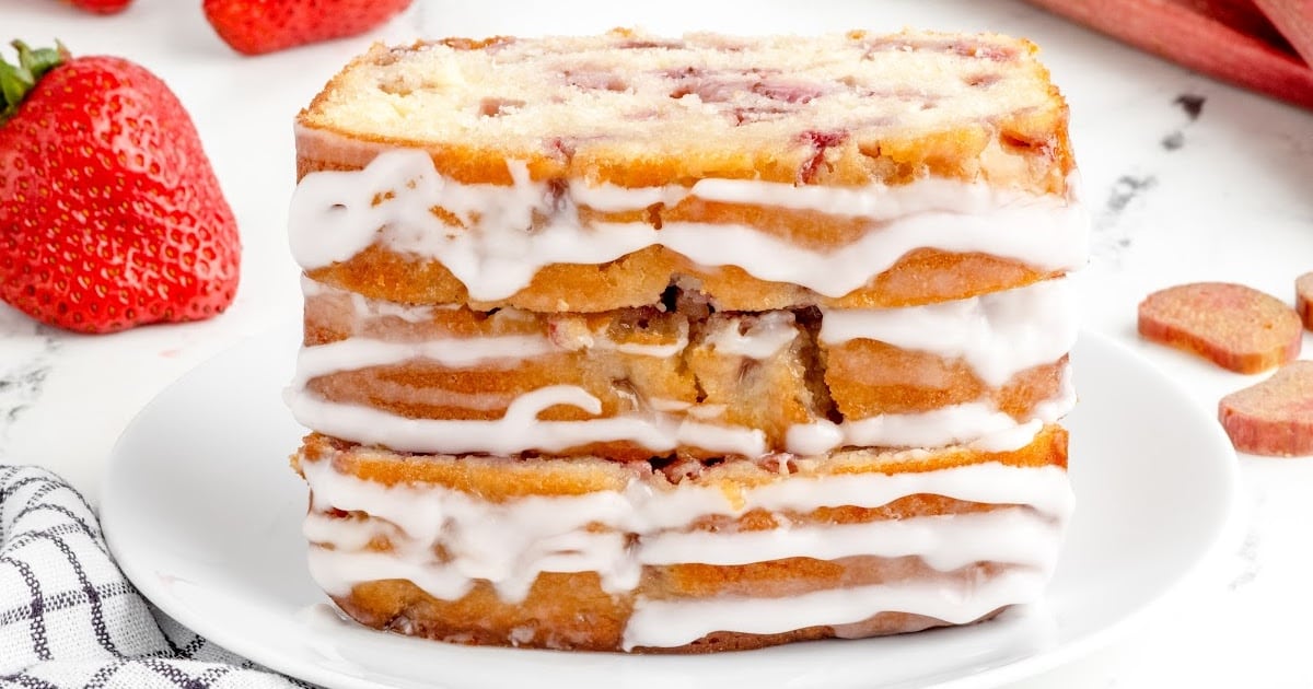 slices of Strawberry Rhubarb Bread on a white plate
