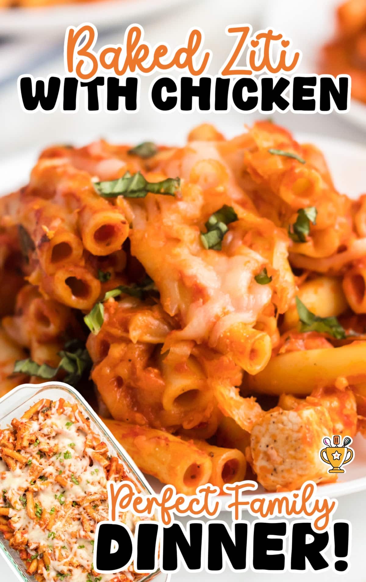 Hearty serving of baked ziti with chunks of chicken, marinara sauce, melted cheese, and fresh basil on a white plate.
