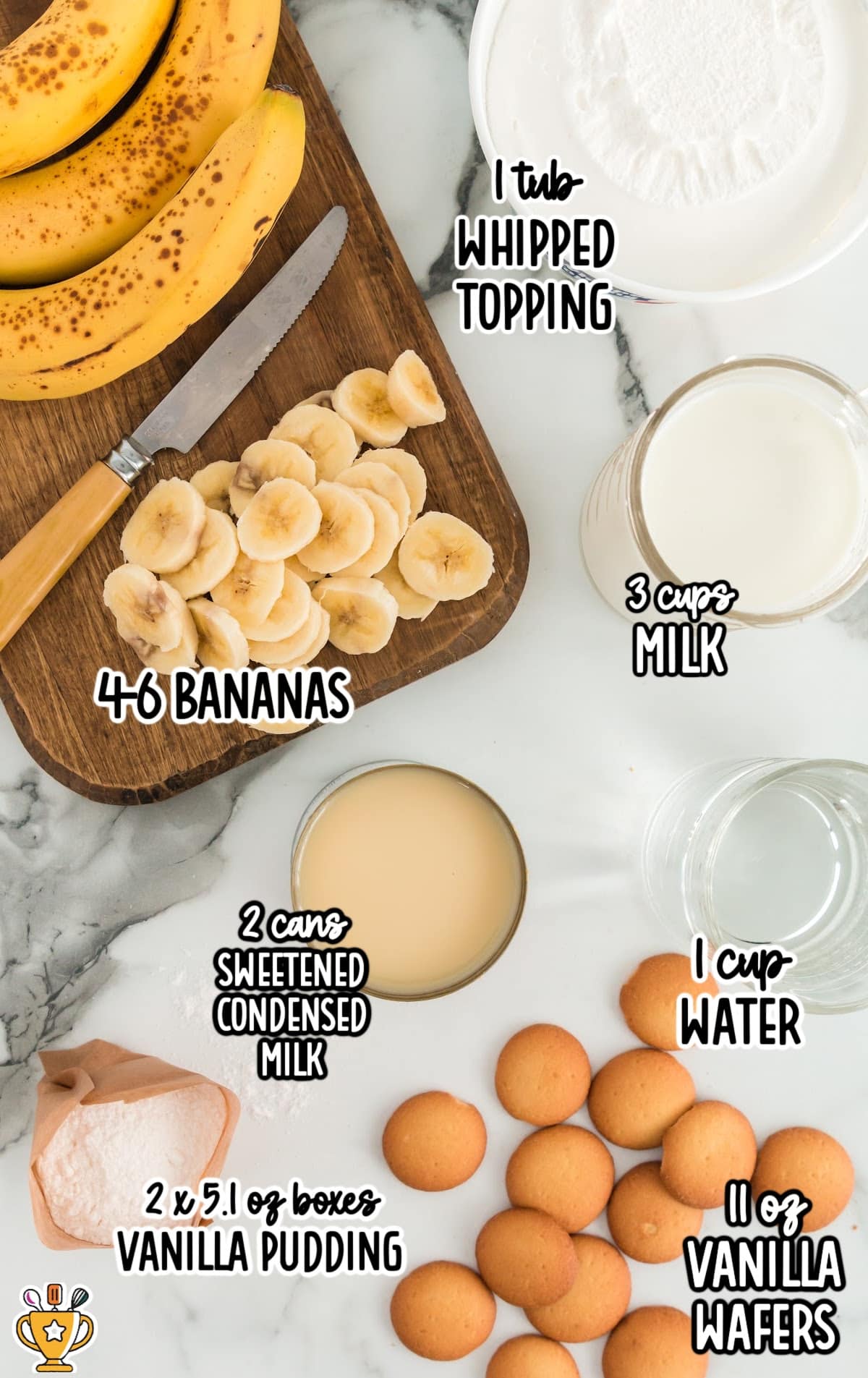 Top-down view of labeled banana pudding ingredients including bananas, sweetened condensed milk, vanilla pudding mix, vanilla wafers, milk, water, and whipped topping.