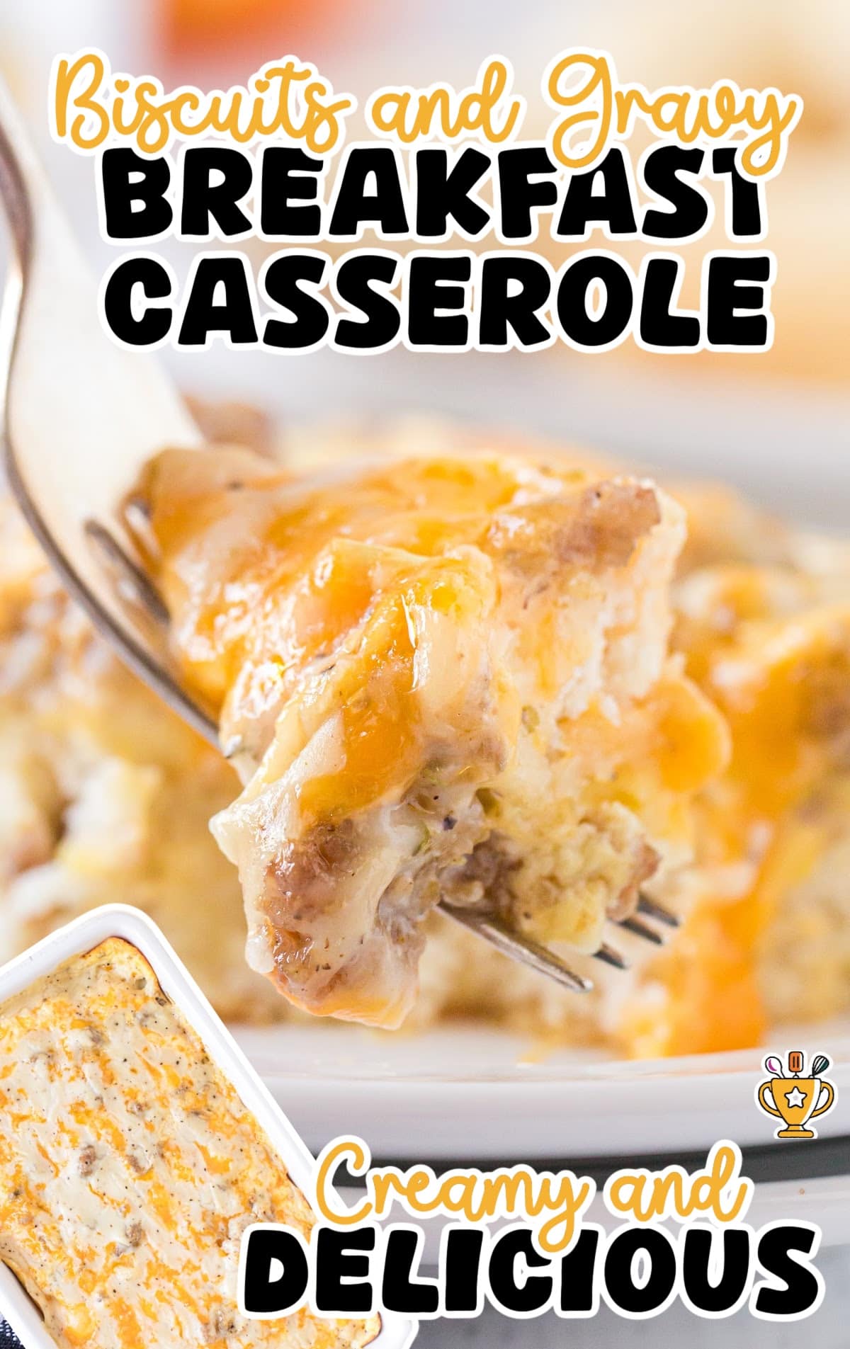 Close-up of a golden, cheesy slice of biscuits and gravy casserole served on a white plate, showcasing its gooey texture.