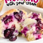 Pin image showing a melty, buttered blueberry muffin cut in half with a muffin tray and bold text overlay.