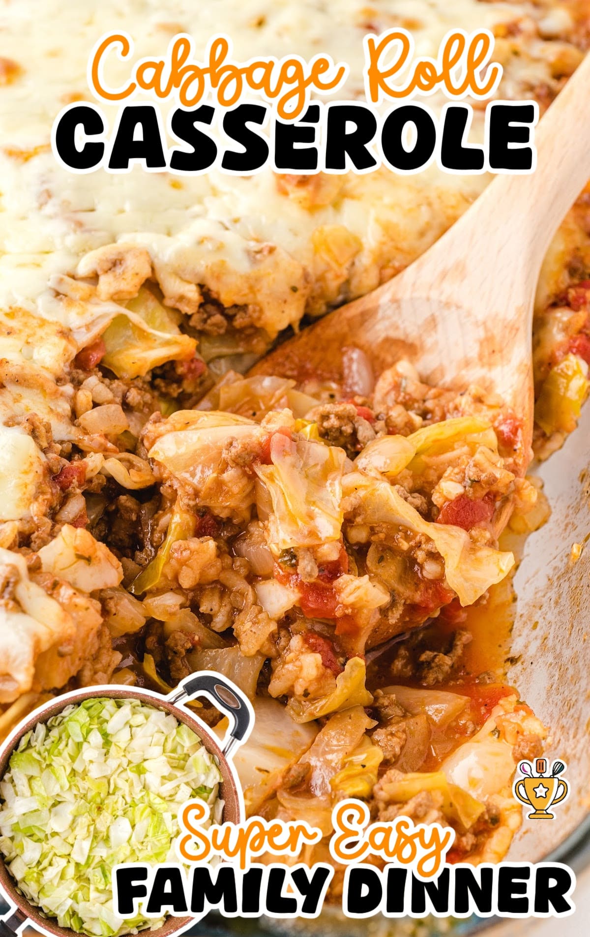 Wooden spoon scooping cheesy cabbage roll casserole from a baking dish, showing tender cabbage, beef, and tomatoes.