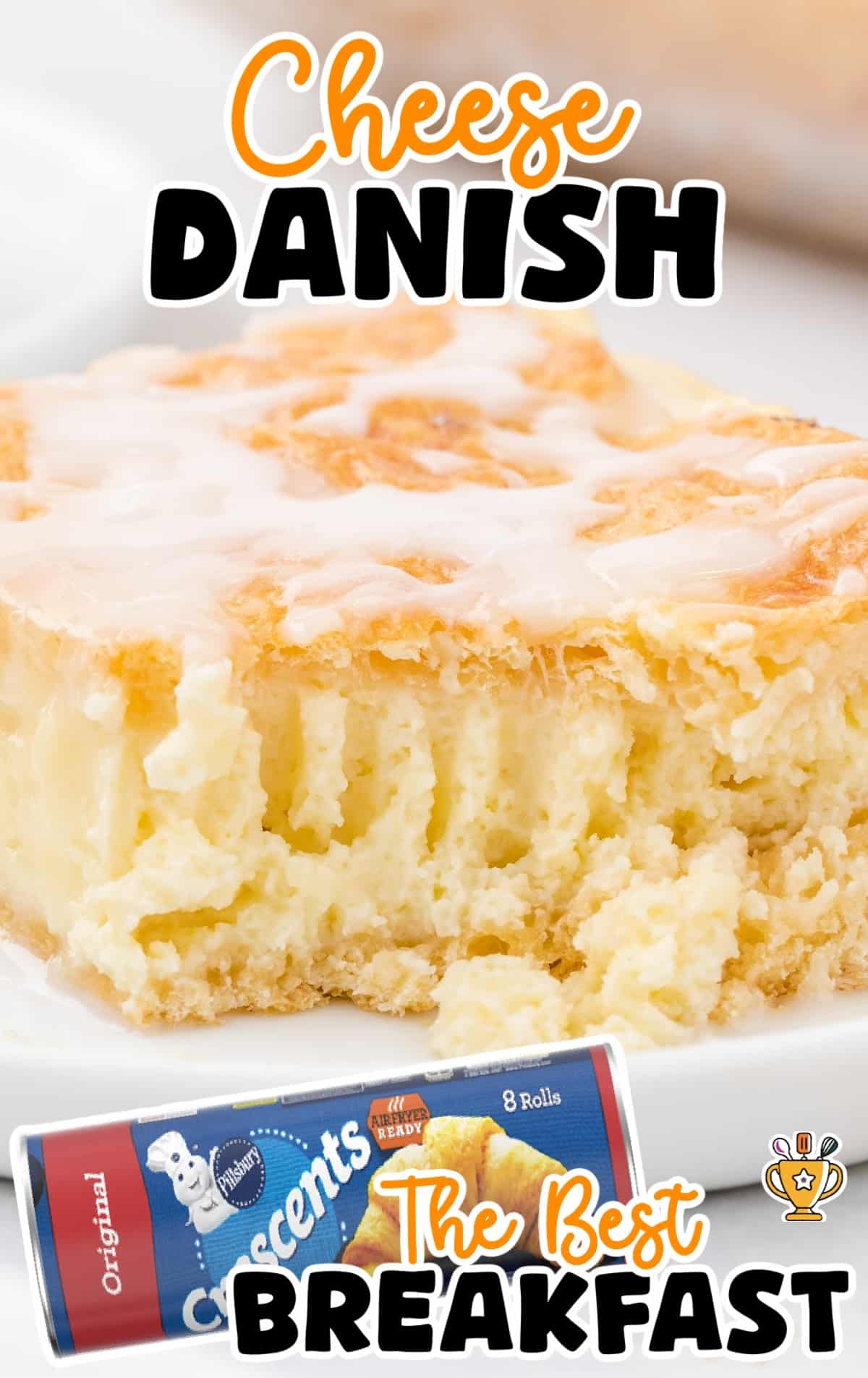 Close-up side angle of a slice of cheese danish with thick creamy filling and flaky crescent roll crust.