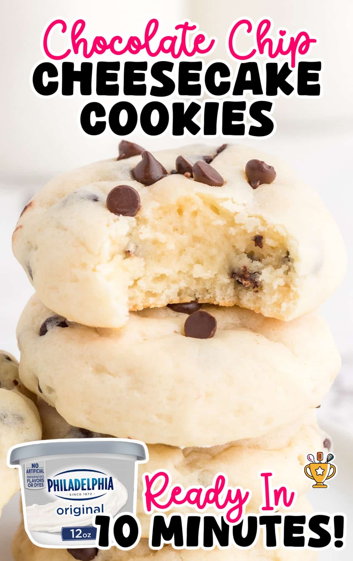 Stack of soft chocolate chip cheesecake cookies with one broken in half to show creamy texture.