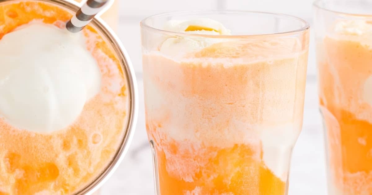 Two tall glasses filled with creamy orange soda floats, one shown from the top and the other from the side, topped with ice cream.