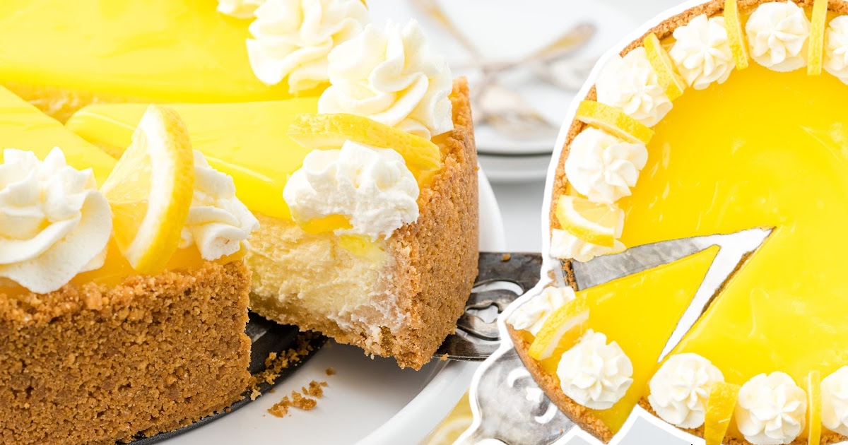 A cheesecake with one slice being lifted out, revealing the thick crust, creamy filling, lemon topping, and piped whipped cream with lemon slices.