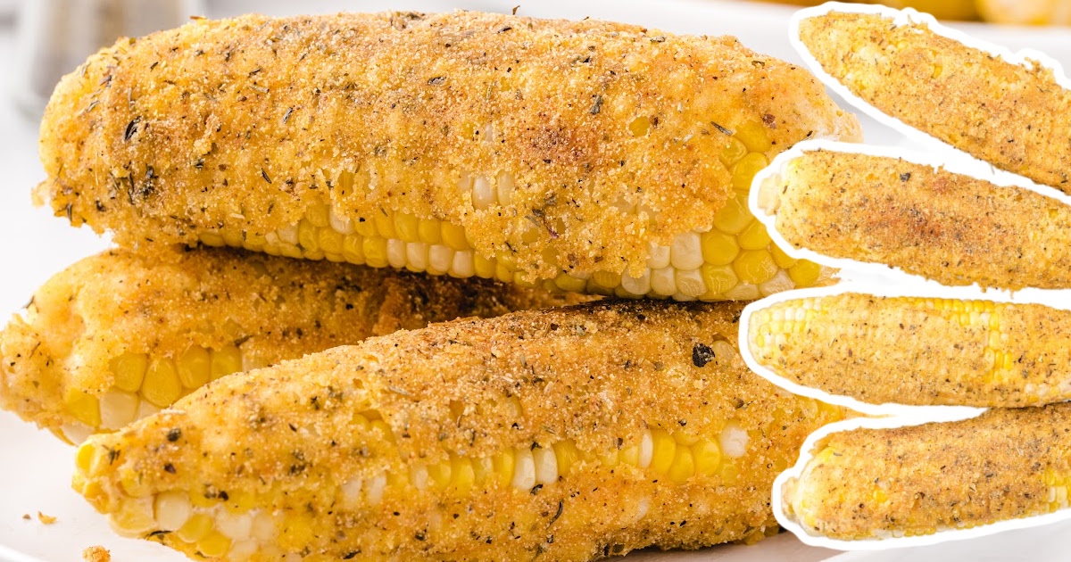 Overhead view of multiple fried corn on the cob stacked on a serving plate, showing the crispy coating.
