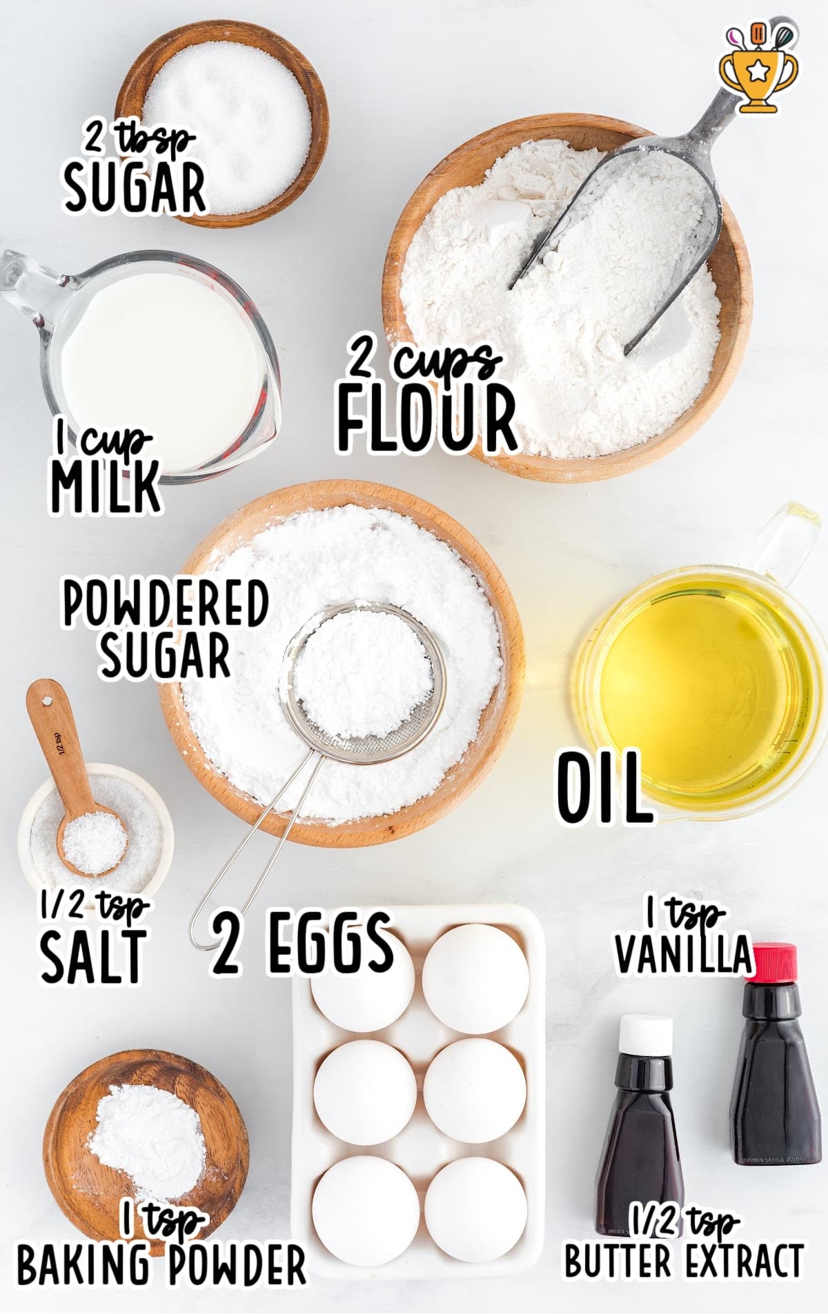 Flat lay of all funnel cake ingredients including flour, sugar, milk, eggs, oil, and vanilla, labeled with bold text.