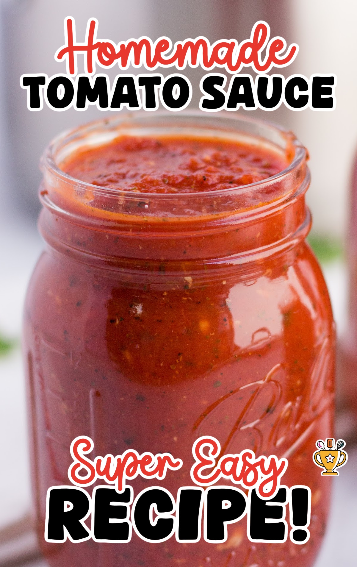 Freshly made tomato sauce in mason jars with vibrant color and visible herbs, perfect for pasta or pizza recipes.