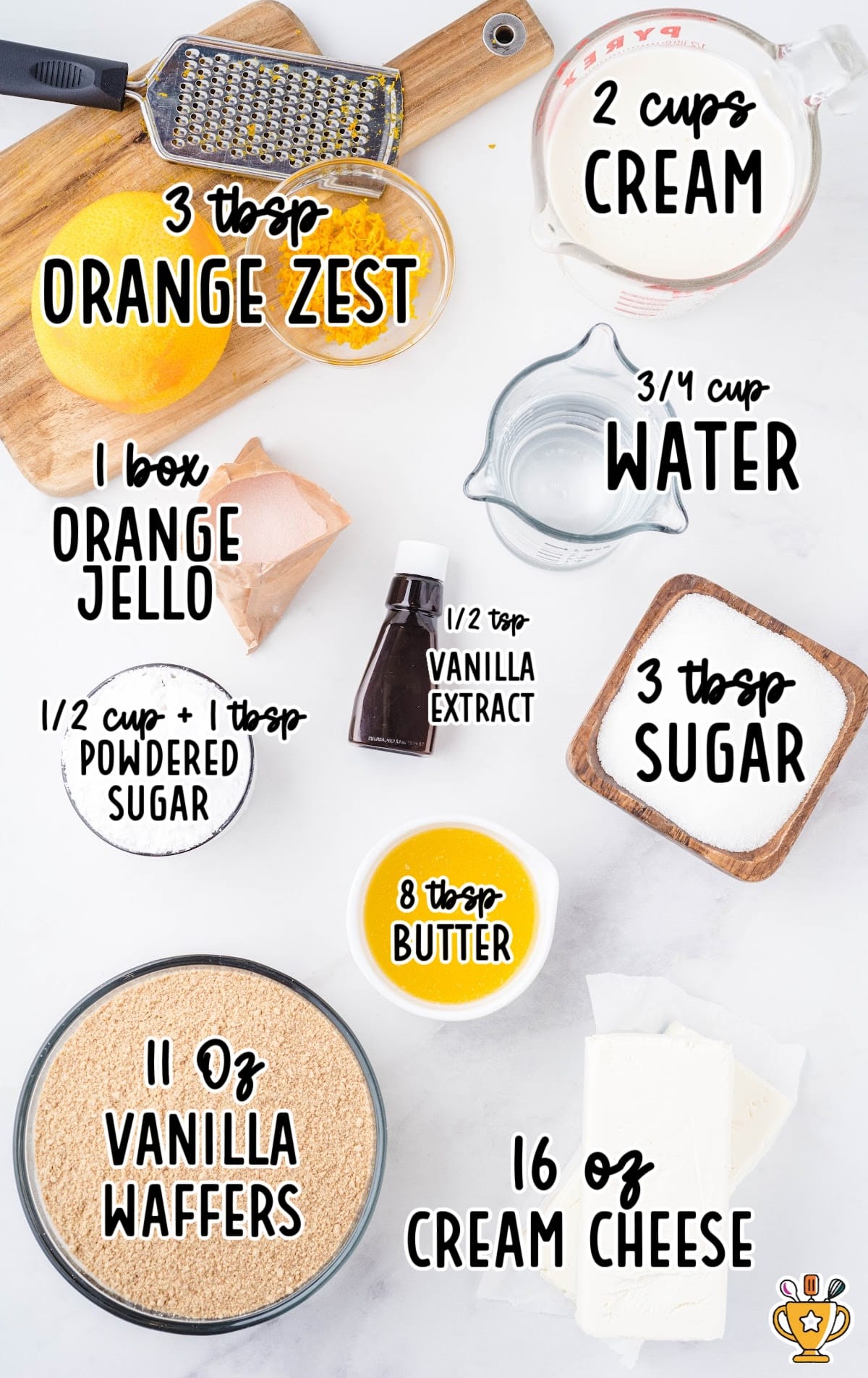 Flat lay of ingredients for an orange creamsicle cake, including vanilla wafers, cream cheese, orange zest, orange jello, powdered sugar, and cream.