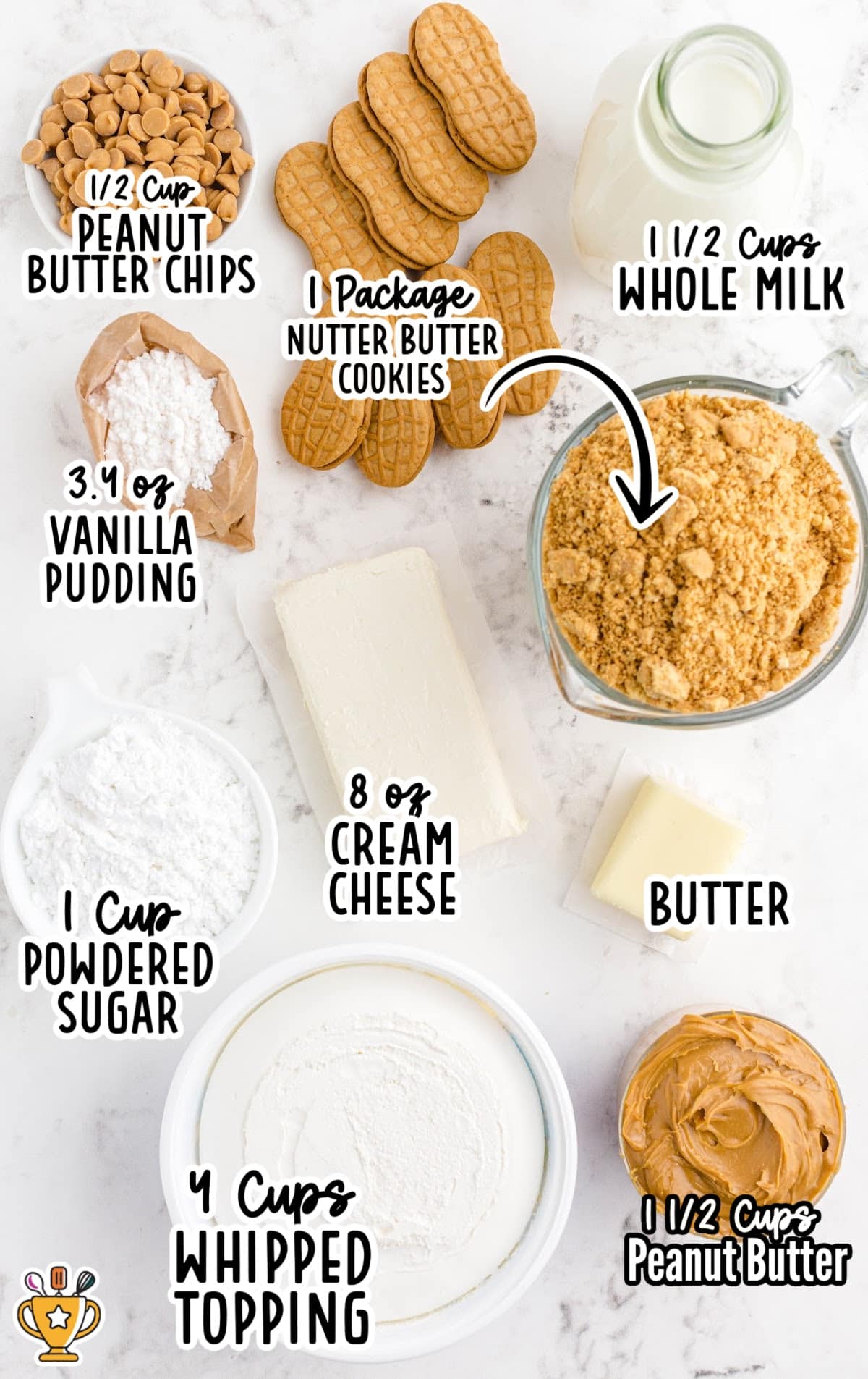 Flat lay of peanut butter lasagna ingredients including whipped topping, peanut butter chips, cookies, vanilla pudding, milk, cream cheese, butter, powdered sugar, and peanut butter.
