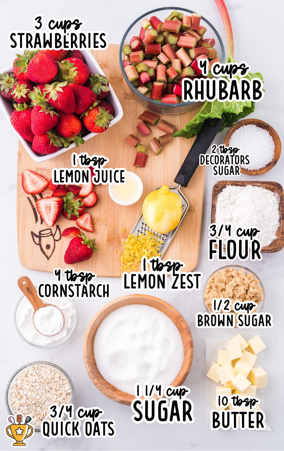 Flat lay of ingredients for rhubarb strawberry crisp, including strawberries, rhubarb, lemon, flour, oats, sugars, and butter, all labeled